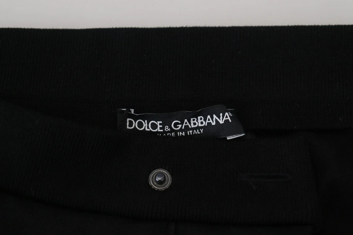 Étiquette noire dolce & gabbana made in italy cousue sur une ceinture en tissu foncé du pantalon jogger en laine noire