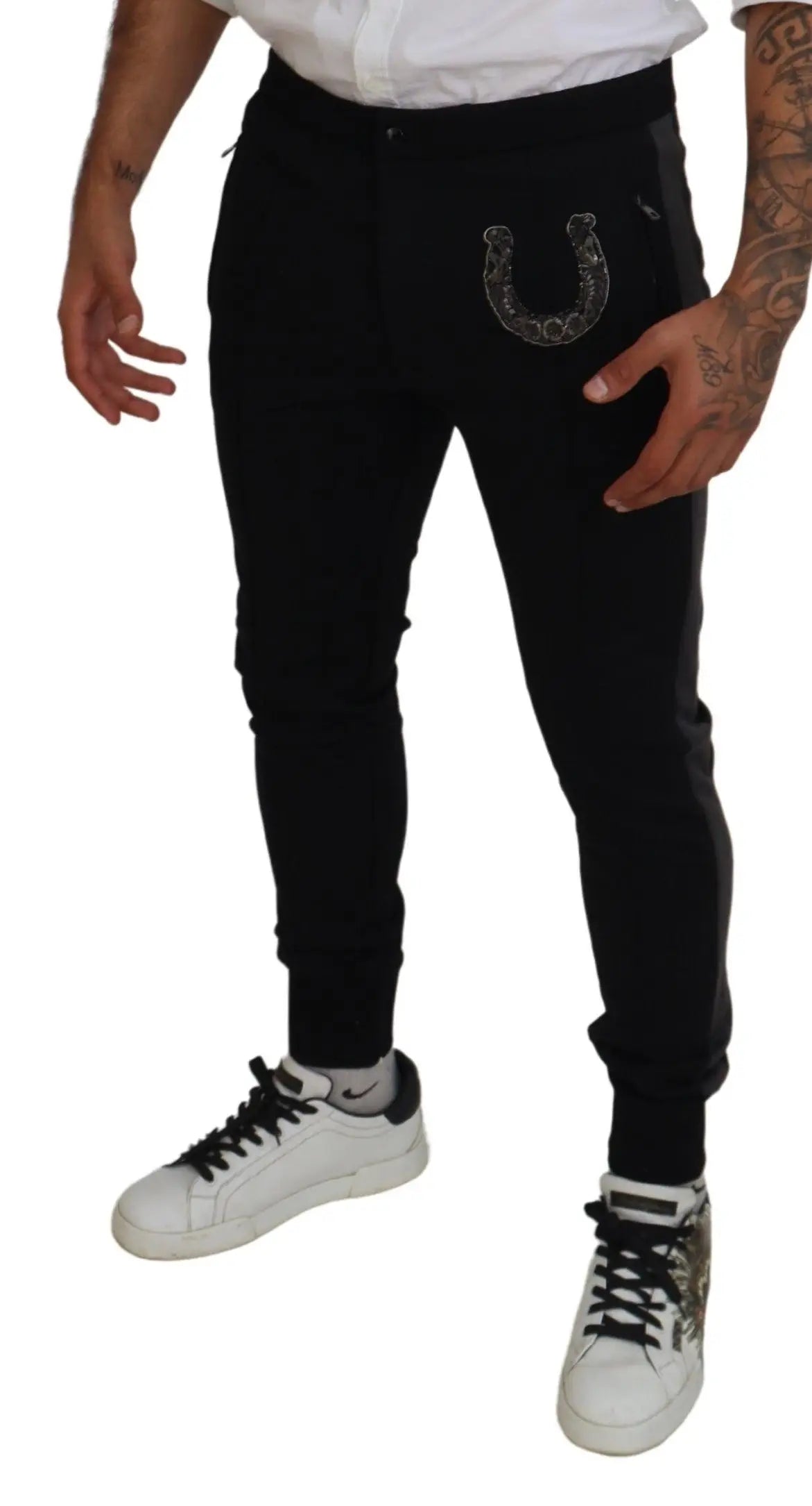 Dolce & Gabbana pantalon jogger noir en laine avec patch fer à cheval décoratif sur la poche avant