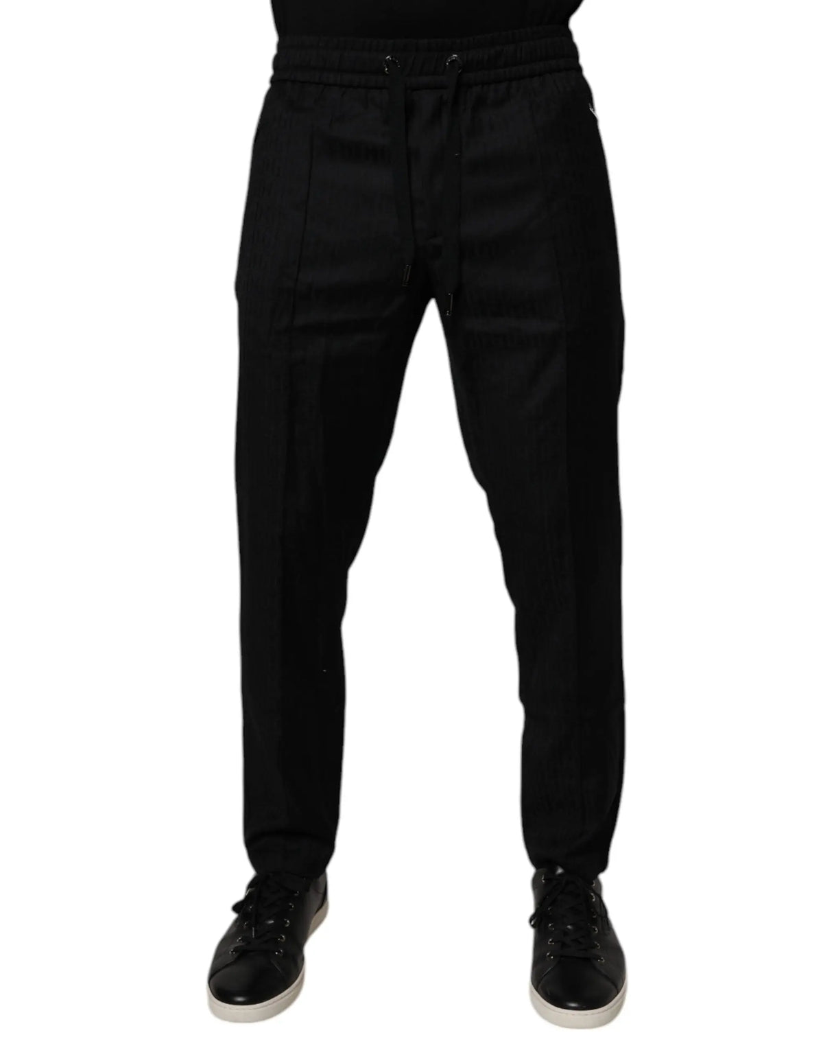 Dolce & gabbana black wool jogger pants with sleek tapered fit and subtle side pockets in black