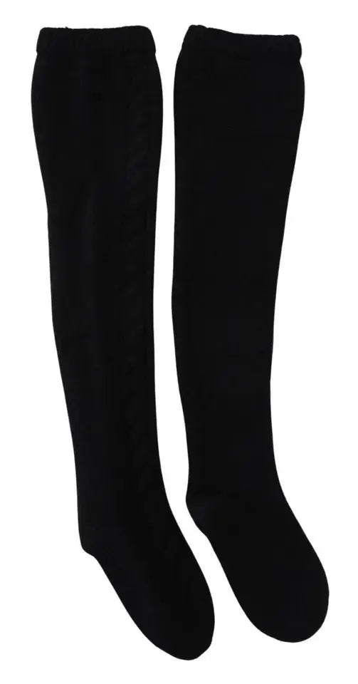 Une paire de chaussettes femmes dolce gabbana noires en laine tricotée montant au mollet avec texture douce et bord élastique