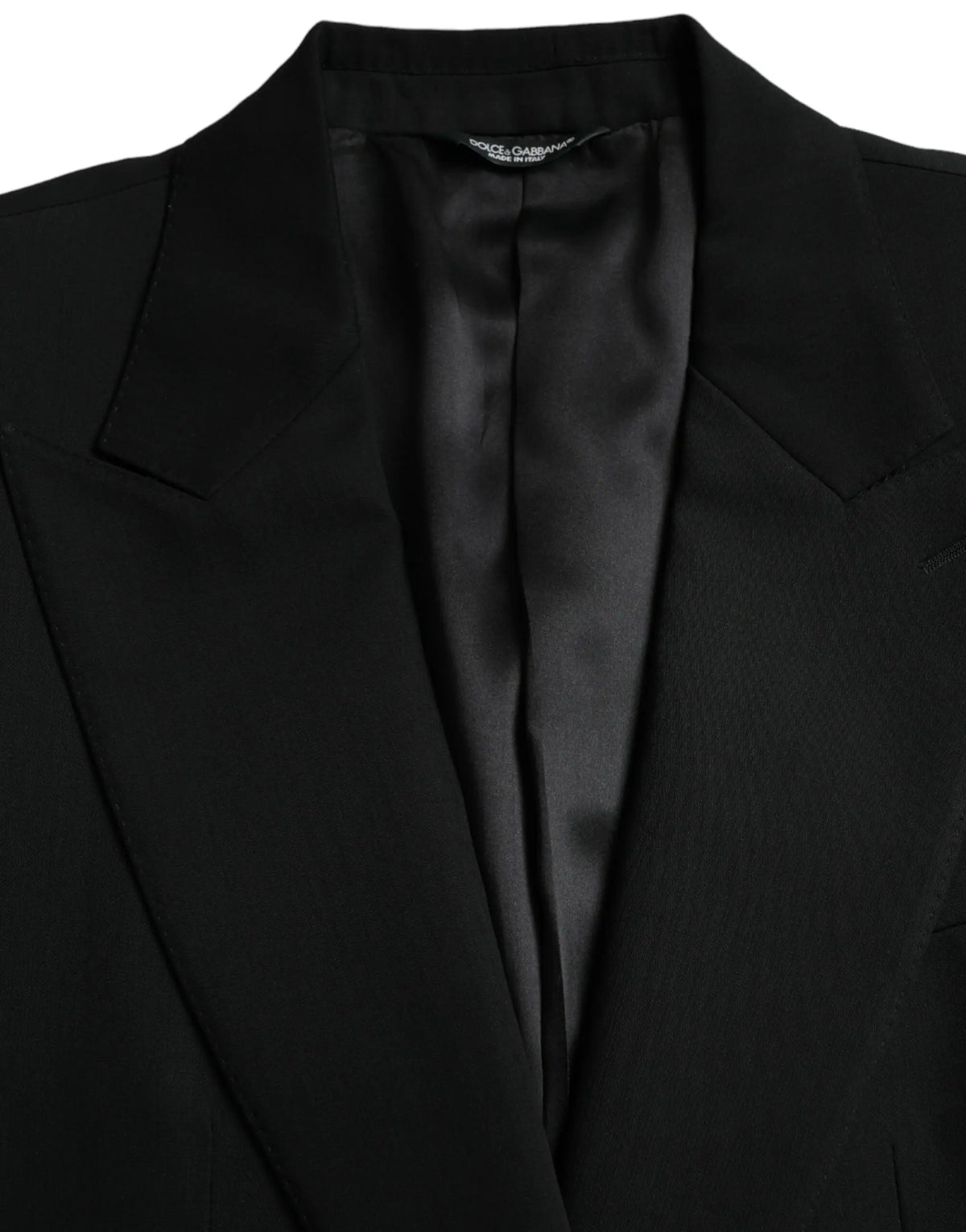 Veste dolce & gabbana noire en laine à coupe ajustée avec intérieur en satin élégante et simple boutonnage