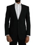 Veste blazer noire dolce gabbana en laine avec fermeture à un bouton et revers crantés