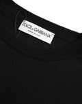Pull over col rond en laine noire dolce & gabbana avec étiquette blanche made in italy cousue à l’intérieur du col
