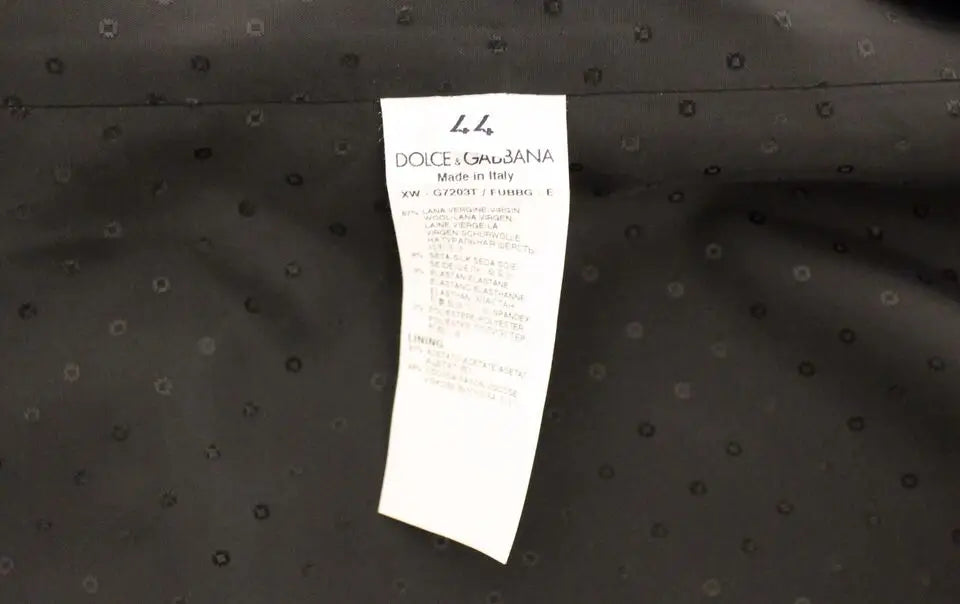 Étiquette d’entretien noire dolce & gabbana avec texte blanc et motif à pois sur veste blazer robe stretch en laine soie noire