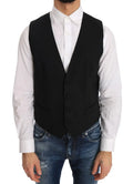 Dolce & gabbana veste noire en laine et soie avec cinq boutons et deux poches latérales