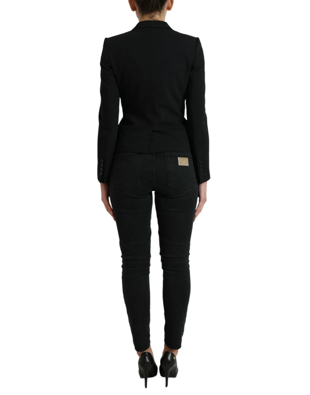 Veste blazer noire en laine dolce & gabbana avec épaules structurées et plaque dorée au dos