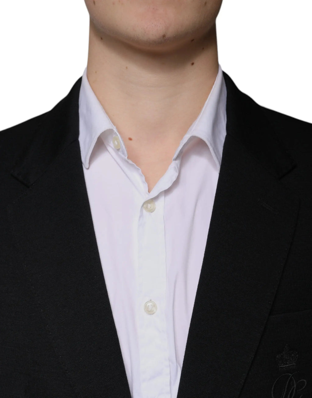 Blazer noir en laine Dolce & Gabbana à tissage texturé subtil porté sur une chemise blanche formelle