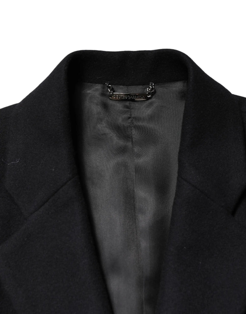 Manteau long en laine noire dolce gabbanas avec doublure satinée et étiquette métallique au col