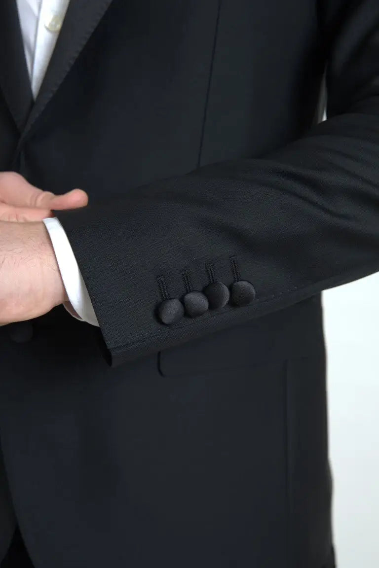 Veste dolce & gabbana martini noire en laine avec quatre boutons assortis sur le poignet manches