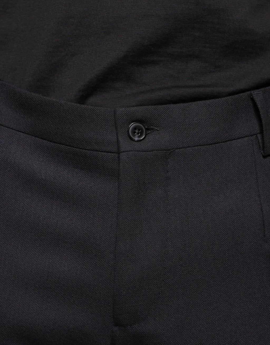 Dolce & Gabbana pantalon habillé noir en laine texturée avec bouton foncé à la taille slim