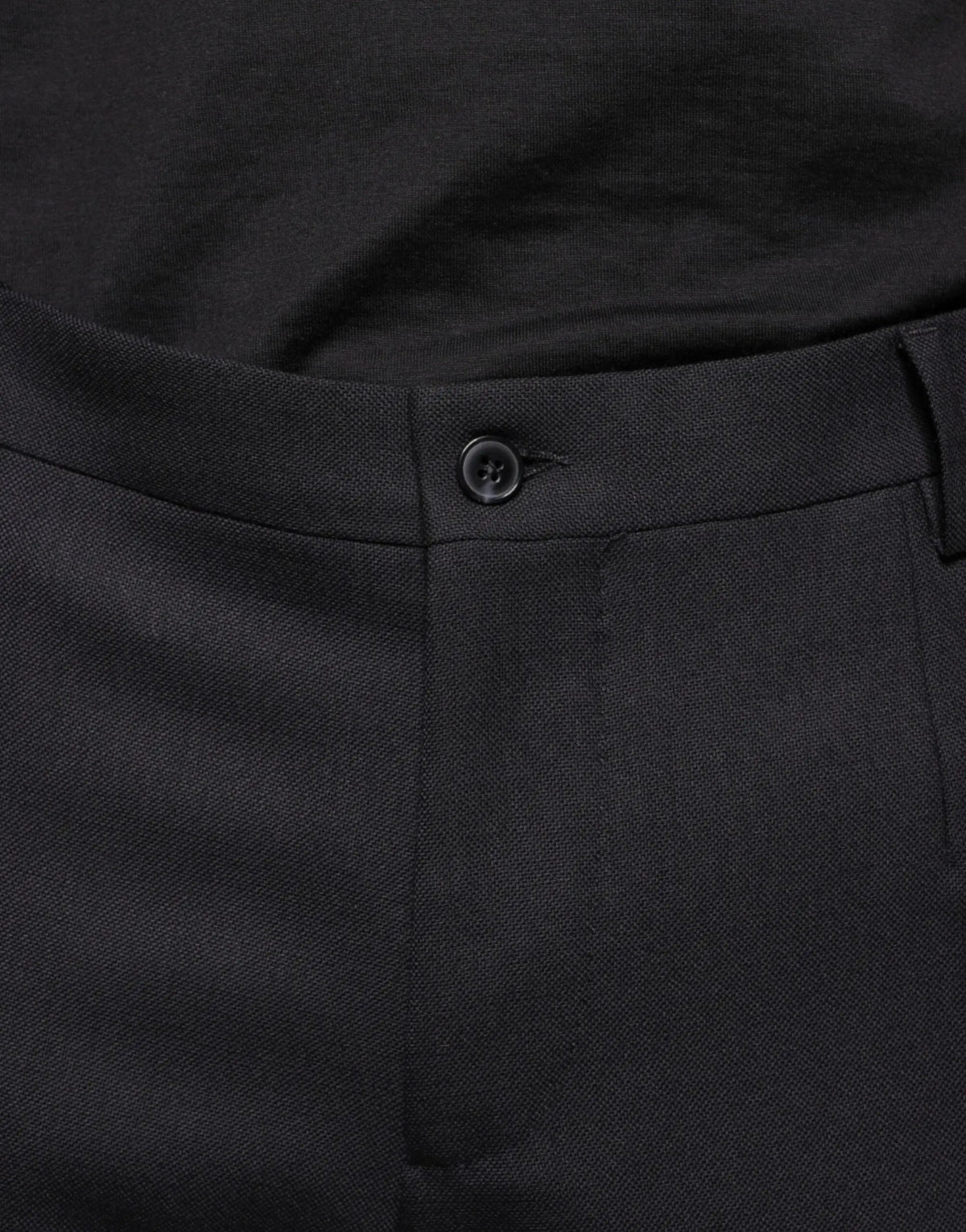 Dolce & Gabbana pantalon habillé noir en laine texturée avec bouton foncé à la taille slim