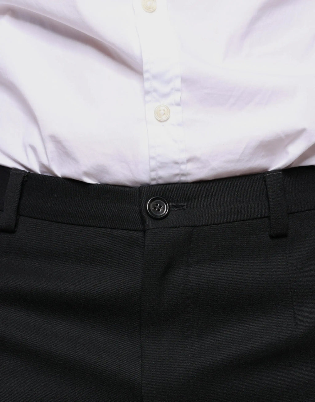 Pantalon homme noir dolce & gabbana en laine coupe skinny avec bouton unique et design structuré élégant