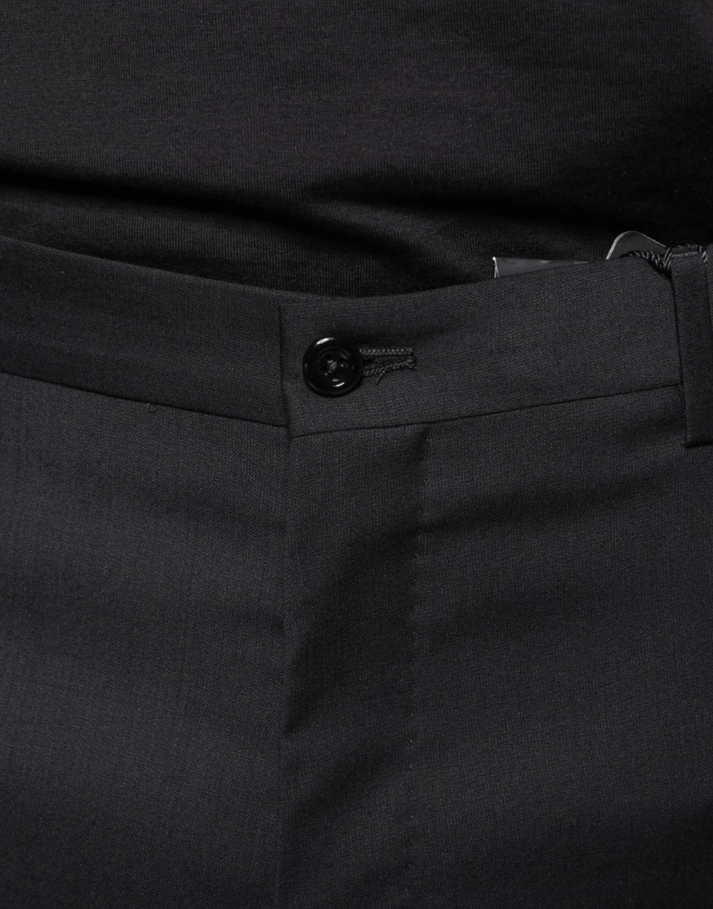 Pantalon slim pour homme dolce & gabbana en laine noire avec boutons et couture discrète élégant et ajusté