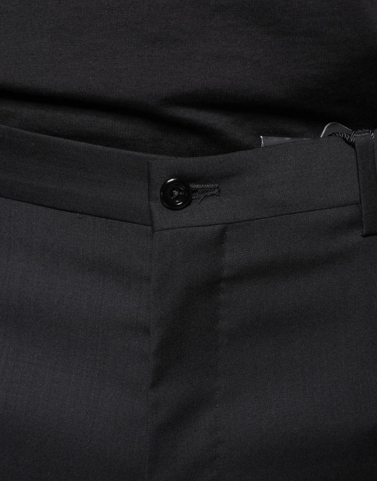Pantalon slim pour homme dolce & gabbana en laine noire avec boutons et couture discrète élégant et ajusté