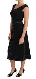 Robe noire dolce & gabbana en laine stretch avec couture blanche et taille cintrée style fourreau ligne a
