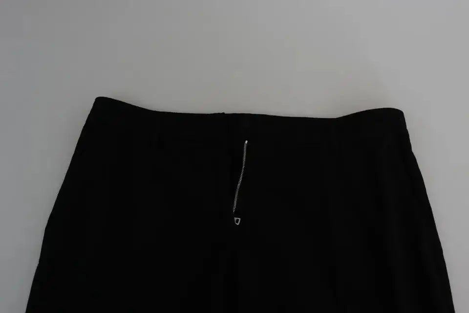 Jupe taille haute noire avec zip central argenté associée au pantalon capri court en laine stretch dolce gabbana