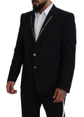 Veste blazer dolce & gabbana noire en laine stretch slim fit avec bordure logo blanche le long des revers
