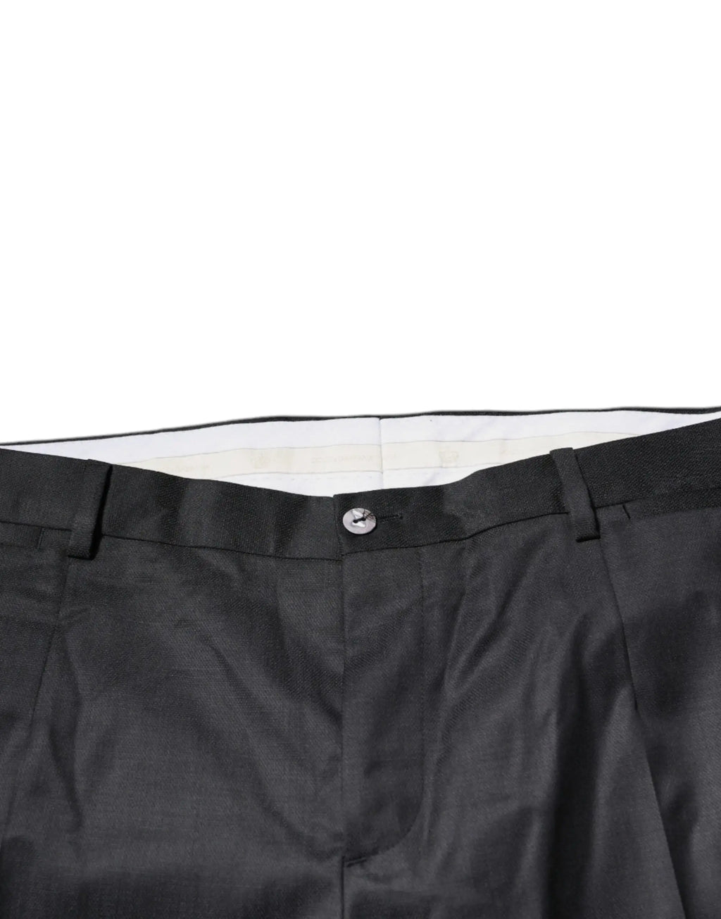 Pantalon habillé noir en laine dolce gabbana avec plis, doublure blanche intérieure et bouton argenté à la taille