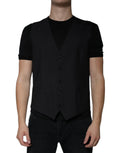 Dolce & Gabbana waistcoat dress en laine noire avec col en v et cinq boutons assortis pour tenue formelle