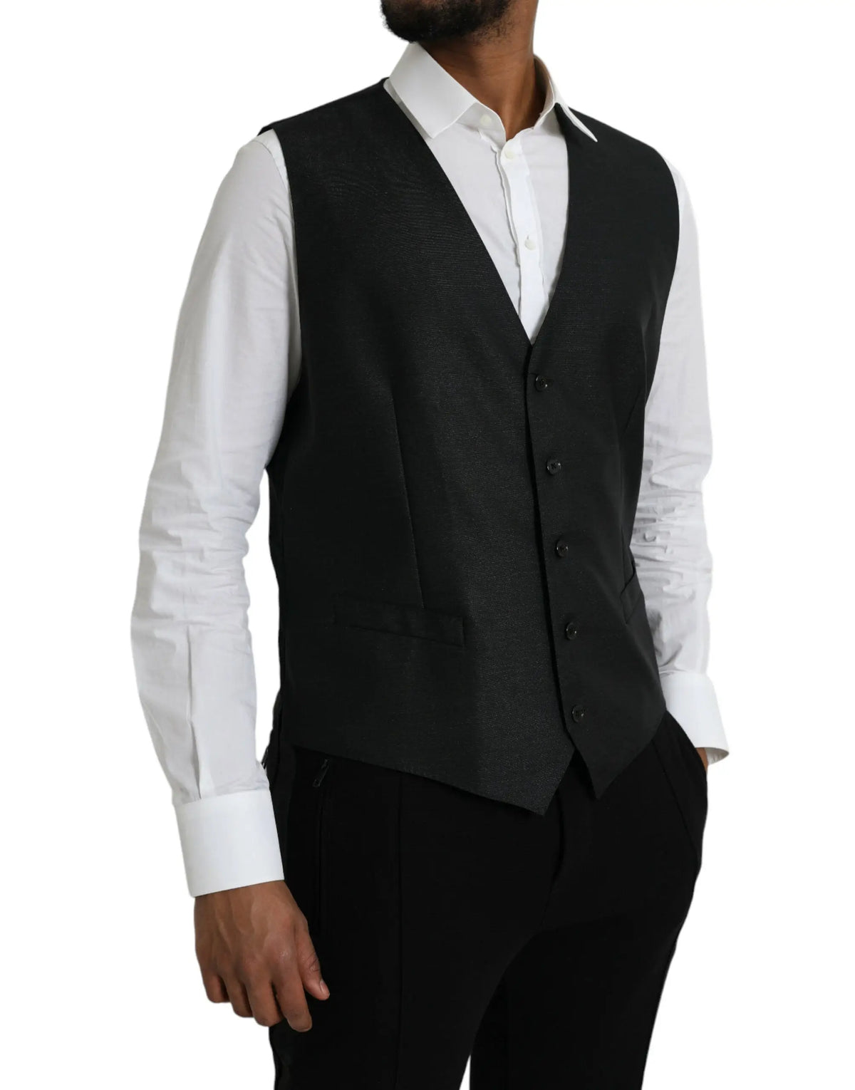 Dolce & Gabbana veste formelle noire en laine texturée avec cinq boutons foncés et coupe ajustée