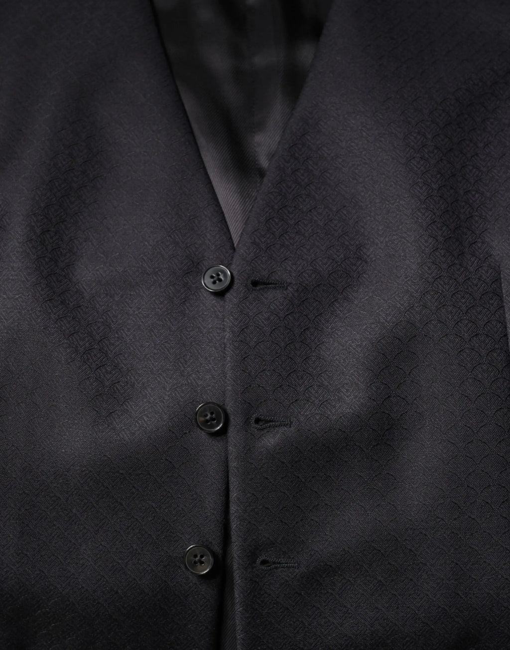 Dolce & gabbana black wool waistcoat dress with subtle diamond-patterned weave and matching dark buttons