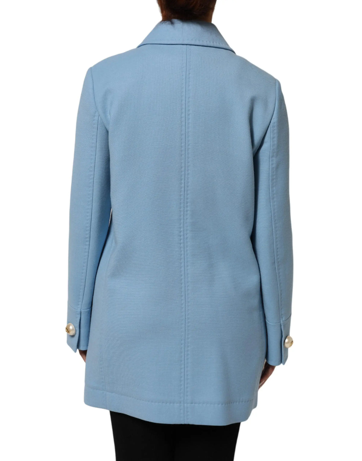 Veste trench dolce & gabbana bleu clair avec col structuré et boutons dorés sur les poignets