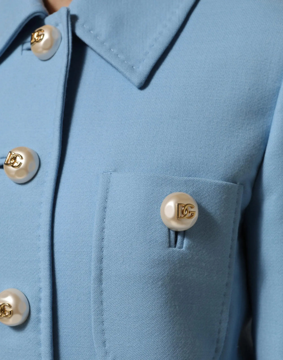 Veste trench Dolce & Gabbana bleue en tissu léger avec boutons en nacre ornés du logo doré dg