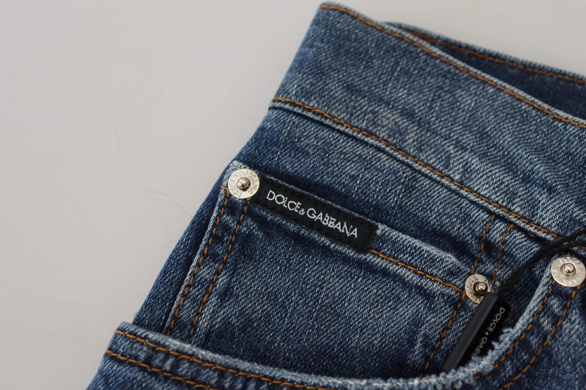 Jeans en denim bleu dolce & gabbana skinny avec étiquette noire cousue à la taille vue de dos