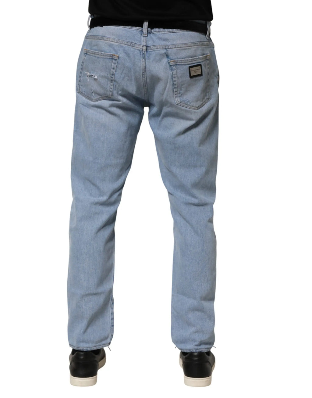 Jeans en denim bleu clair dolce & gabbana en coton avec coupe slim et légère détresse au niveau des poches arrière vue dos