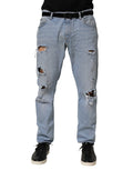 Jean slim bleu clair en coton dolce & gabbana avec détails déchirés aux cuisses et genoux