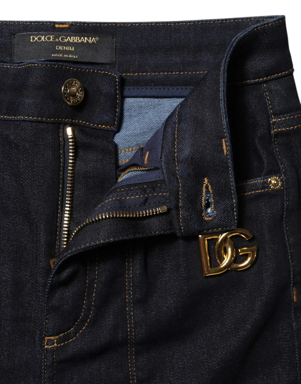 Jean denim skinny bleu foncé dolce gabbana en coton taille haute avec plaque logo dg dorée et accessoires assortis