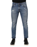 Jean slim bleu en denim coton avec logo plaque dolce & gabbana et revers roulés style déchiré