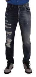 Jeans dolce & gabbana en denim coton bleu foncé avec détails déchirés sur la jambe gauche