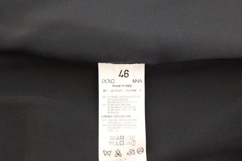 Étiquette rectangulaire blanche avec texte noir dolce & gabbana taille 46 pour veste blazer bleue en coton stretch made in italy