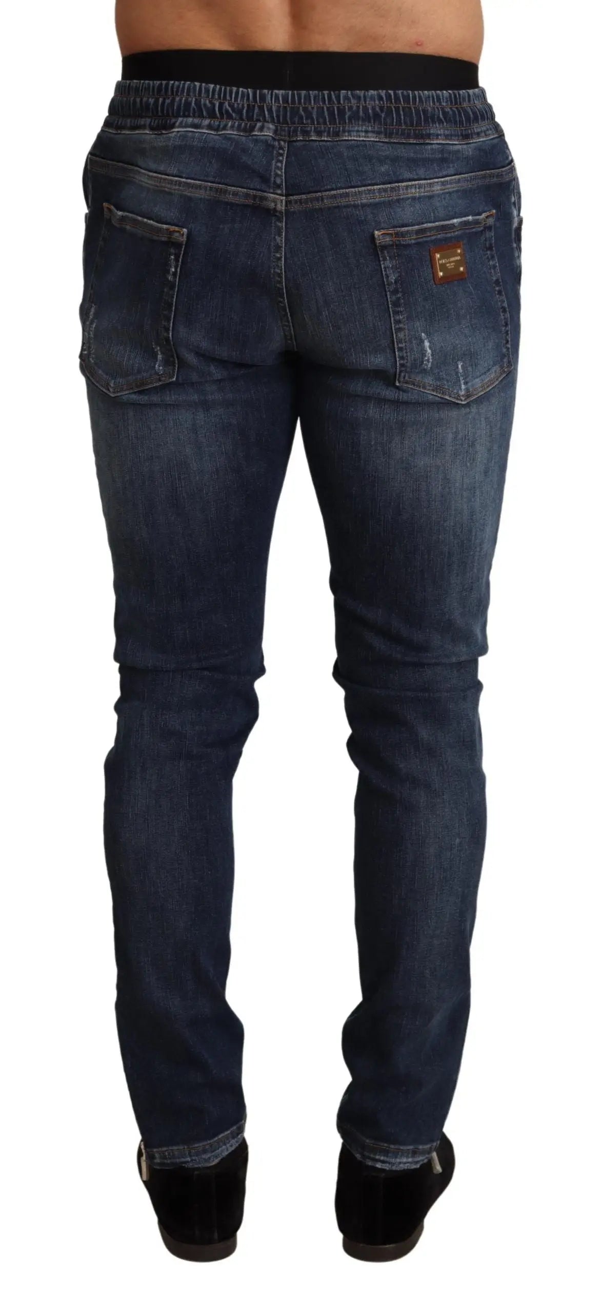 Jean slim fit bleu foncé en coton stretch dolce & gabbana avec détails déchirés et taille élastique noire
