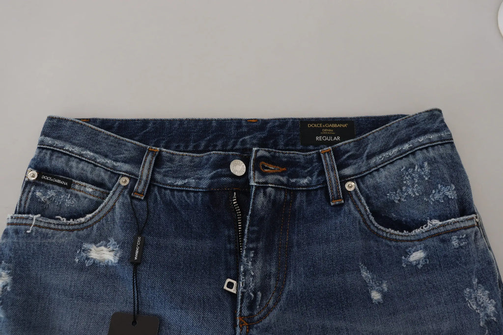 Jeans denim hommes dolce & gabbana en coton bleu foncé délavé avec détails usés et étiquettes visibles