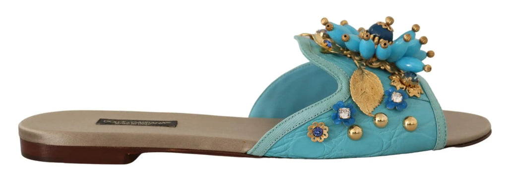 Sandale slide turquoise dolce & gabbana en cuir exotique avec strass bleus et détails floraux dorés