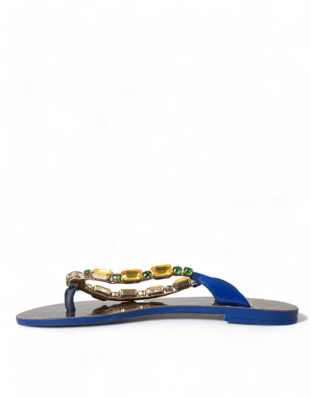 Dolce gabbana sandales plates en cuir bleu avec bride décorative alternant pierres précieuses jaunes et vertes