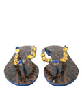 Dolce & gabbana sandales plates leopard avec brides ornées de pierres bleues et jaunes pour plage