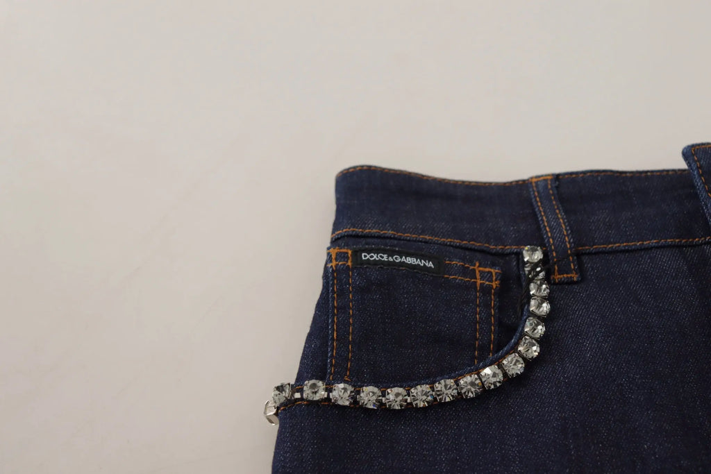 Jean short blue denim stretch dolce & gabbana avec chaîne décorative en cristaux sur la poche arrière