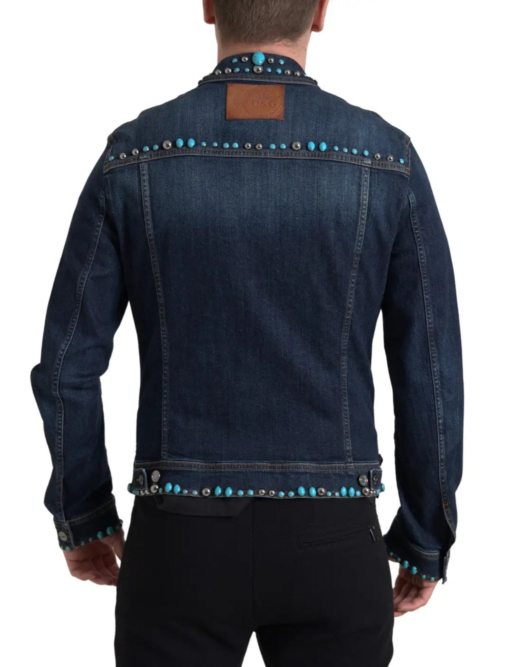 Veste en denim bleu dolce gabbana ornée de pierres turquoise sur le col, épaules, poignets et ourlet