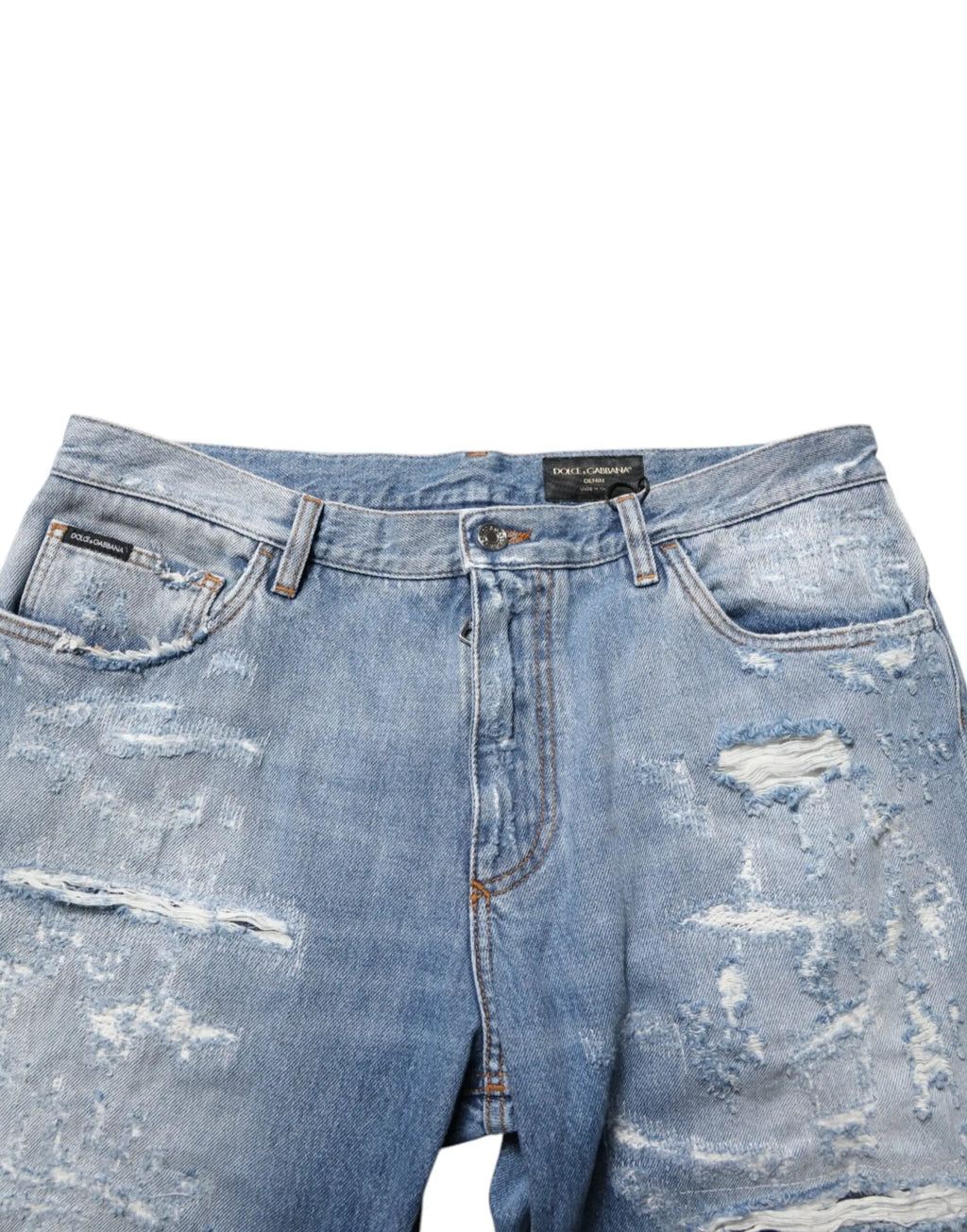 Short en jean délavé bleu dolce & gabbana avec détails déchirés et étiquette visible sur le devant