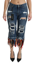 Pantalon capri en jean coton bleu dolce gabbana avec patchs usés et détails colorés en franges au bas