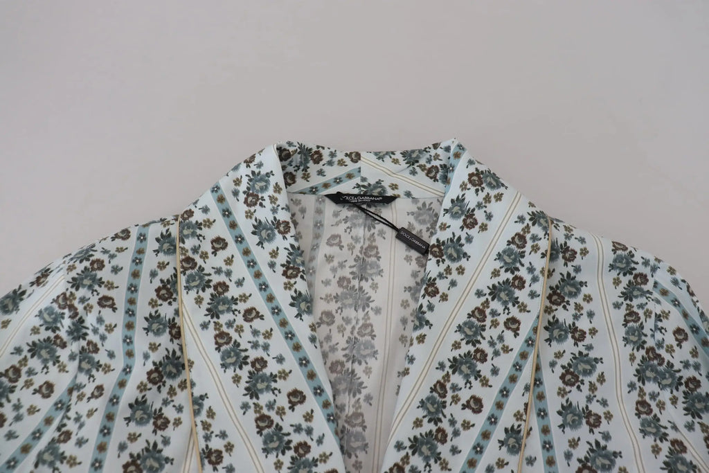 Une blouse dolce & gabbana bleu clair et blanc à motifs floraux avec rayures verticales en coton