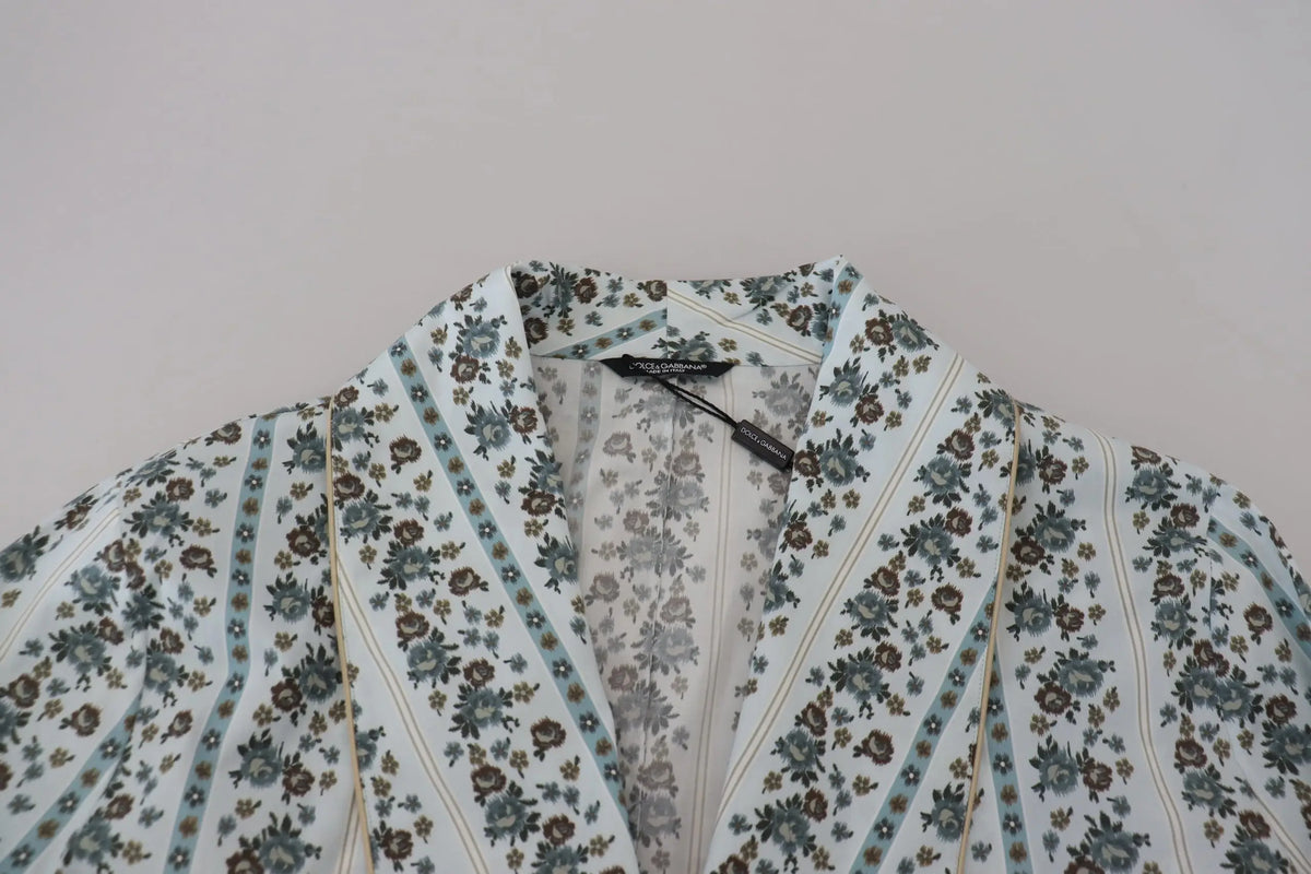Une blouse dolce & gabbana bleu clair et blanc à motifs floraux avec rayures verticales en coton