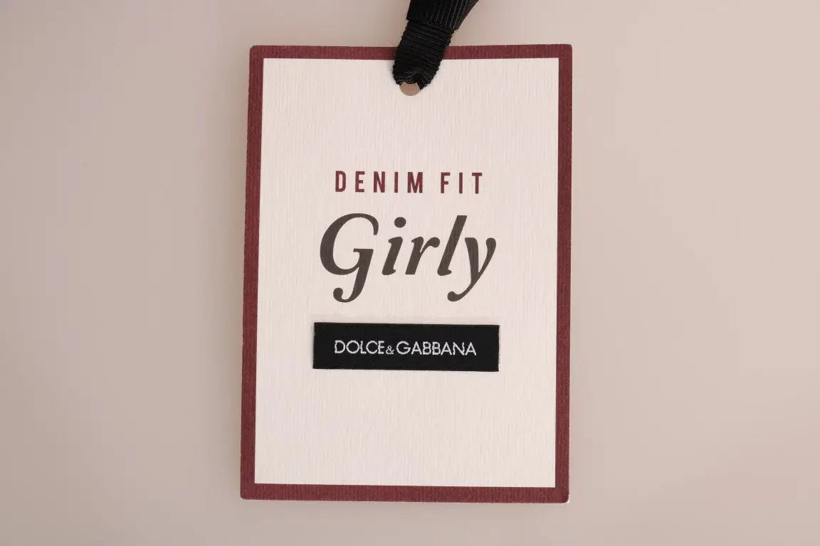 Étiquette blanche rectangulaire avec bordure bordeaux et texte noir denim fit girly sur jean rayé bleu en coton Dolce & Gabbana