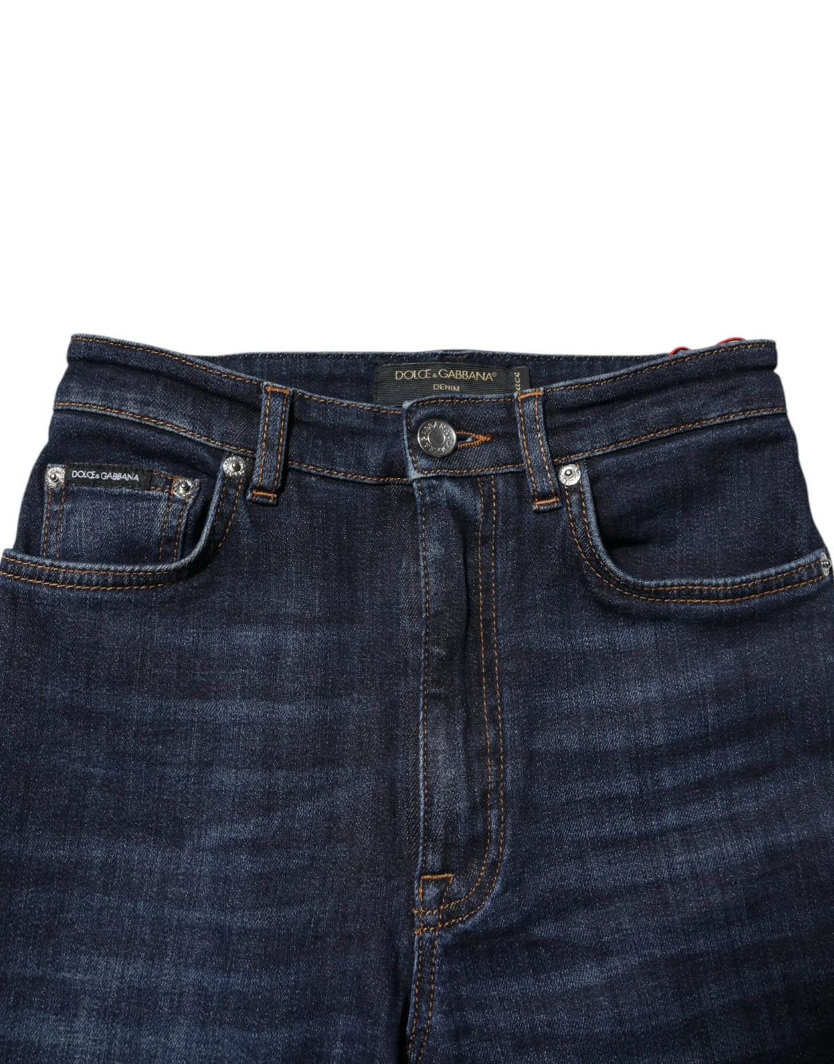 Jean skinny taille haute bleu indigo dolce gabbana en denim avec poches classiques et boutons argentés