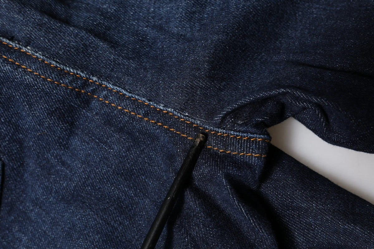 Tissu en denim bleu foncé avec surpiqûres marron contrastantes pour les jeans skinny taille haute dolce & gabbana blue grace