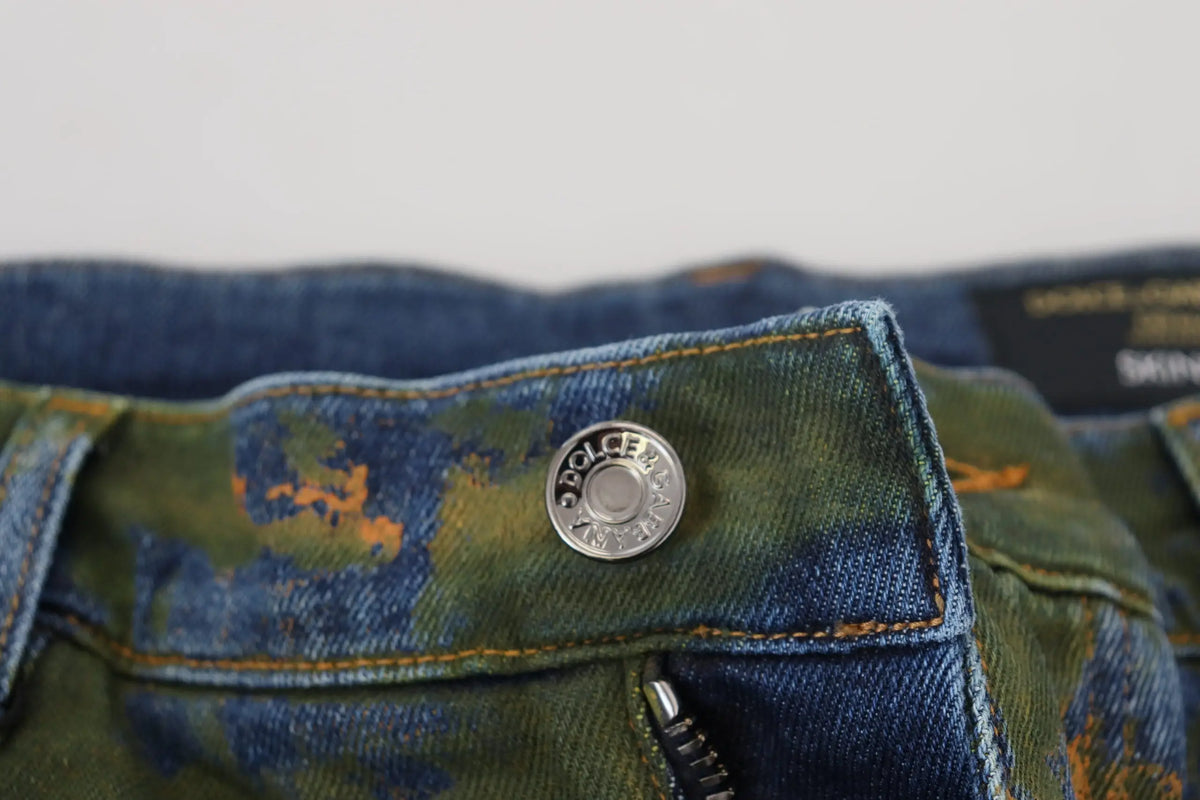 Bouton argenté dolce & gabbana sur jean skinny en coton délavé avec motif camouflage bleu vert orange