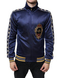 Veste de survêtement en satin bleu marine dolce & gabbana avec manches bordées d étoiles or et blanches et écusson royal